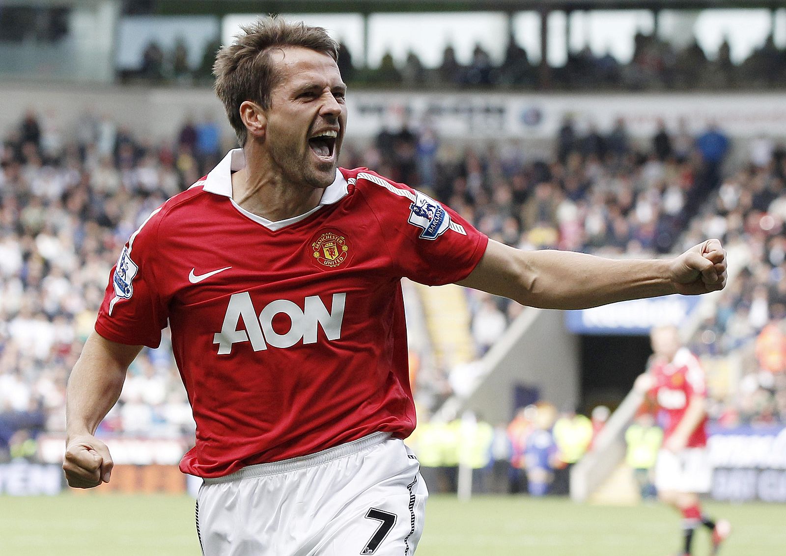 Manchester United's Owen celebrates after scoring during their English Premier League soccer match against Bolton Wanderers at the Reebok Stadium in Bolton