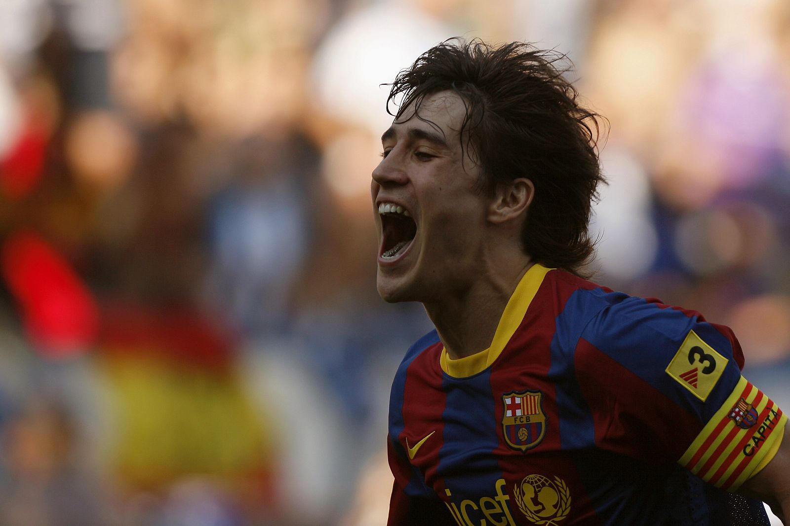 Barcelona's Bojan celebrates after scoring a penalty against Malaga during their Spanish First Division soccer match in Malaga