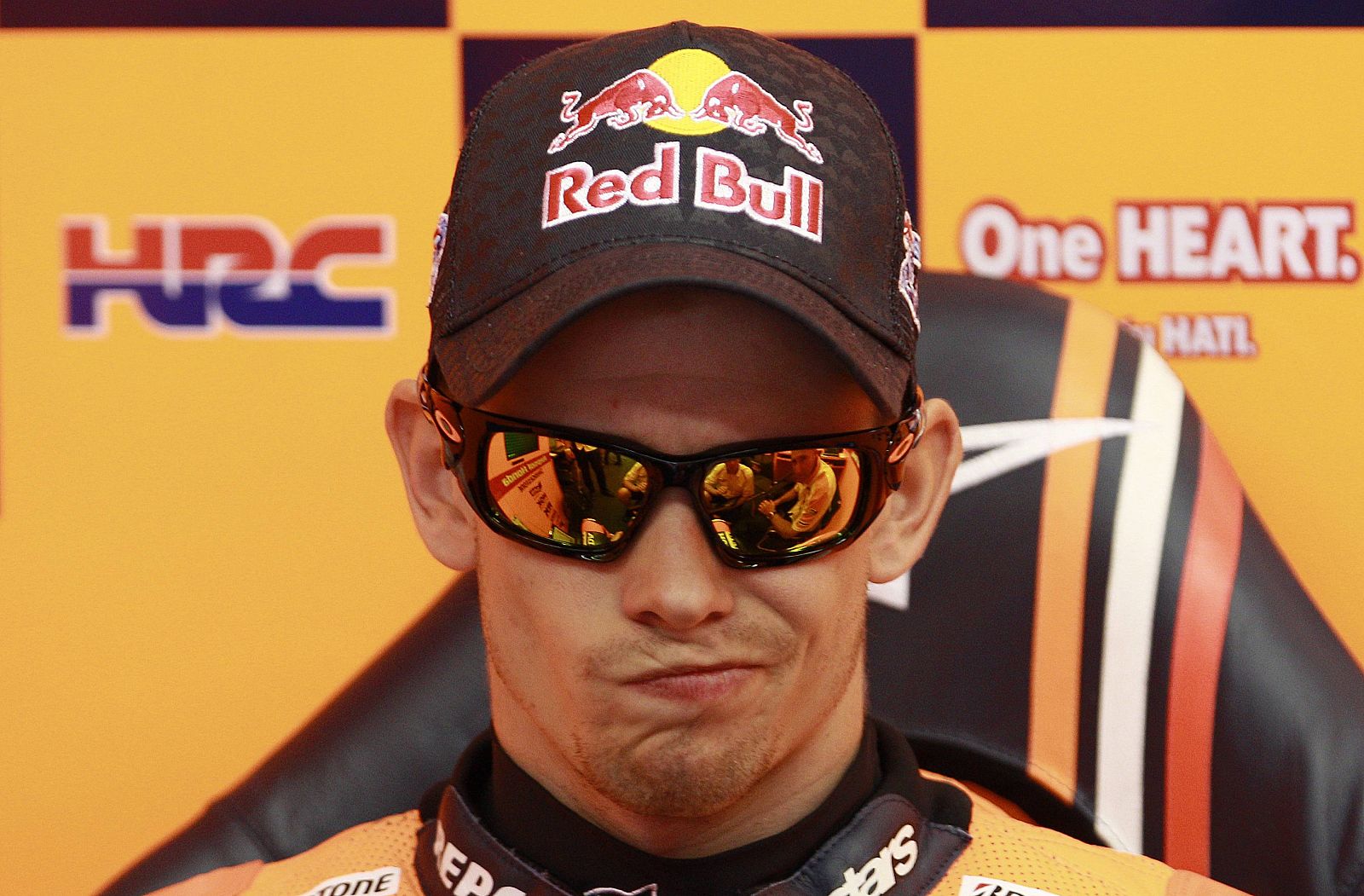 Honda MotoGP rider Casey Stoner of Australia makes a face as he sits in his box during the second practice session for the Italian motorcycling Grand Prix at Mugello circuit