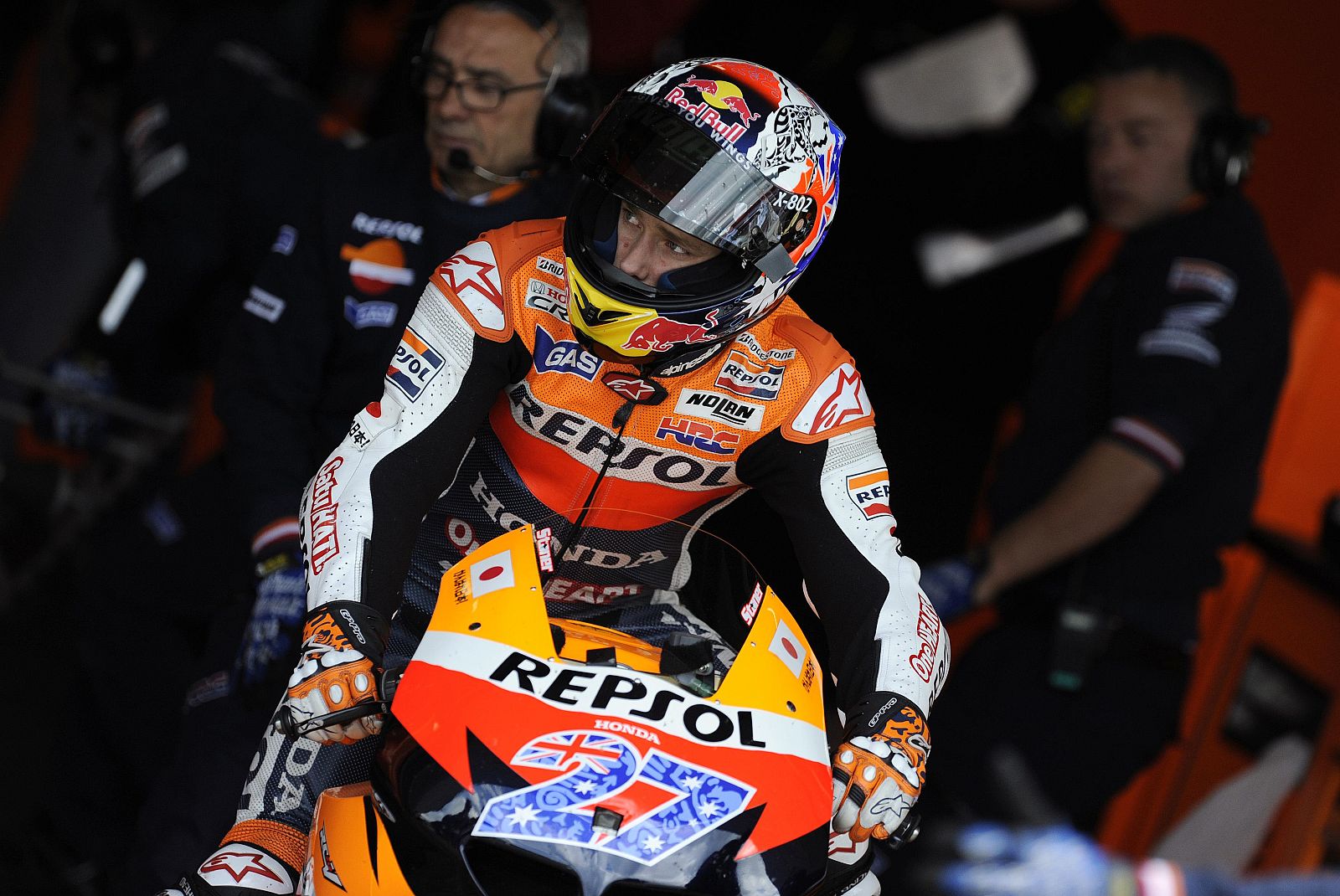 Repsol Honda MotoGP rider Stoner of Australia leaves the pits during qualifying for the British motorcycling Grand Prix at the Silverstone circuit