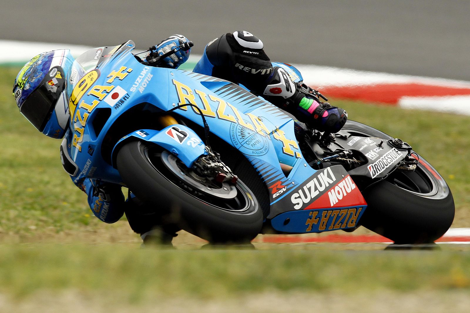 Suzuki MotoGP rider Bautista of Spain takes a curve during the second practice session for the Italian motorcycling Grand Prix at Mugello circuit
