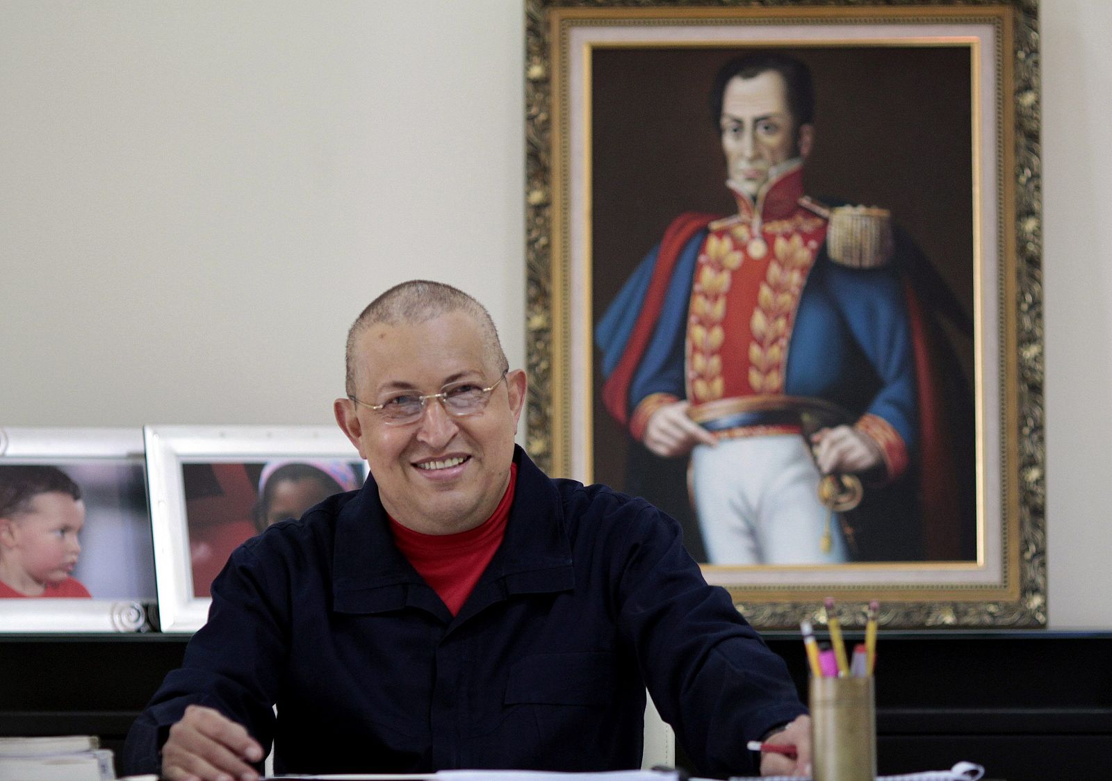 Venezuela's President Chavez talks at his office at Miraflores Palace in Caracas