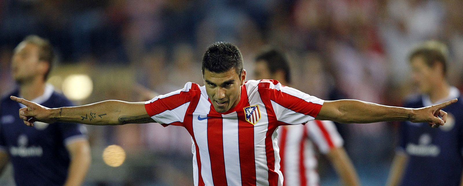 Atletico Madrid's Reyes celebrates his goal against Stromsgodset during their Europa League third qualifying round first leg soccer match at Vicente Calderon stadium in Madrid