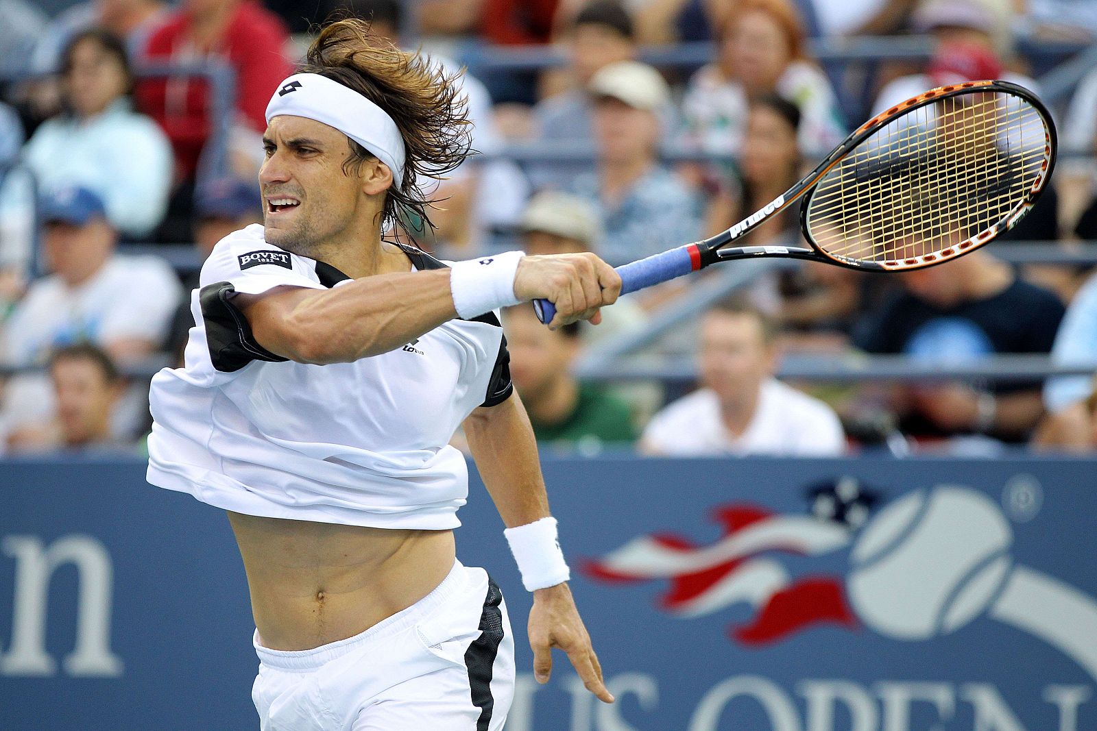 David Ferrer devuelve una bola a James Blake