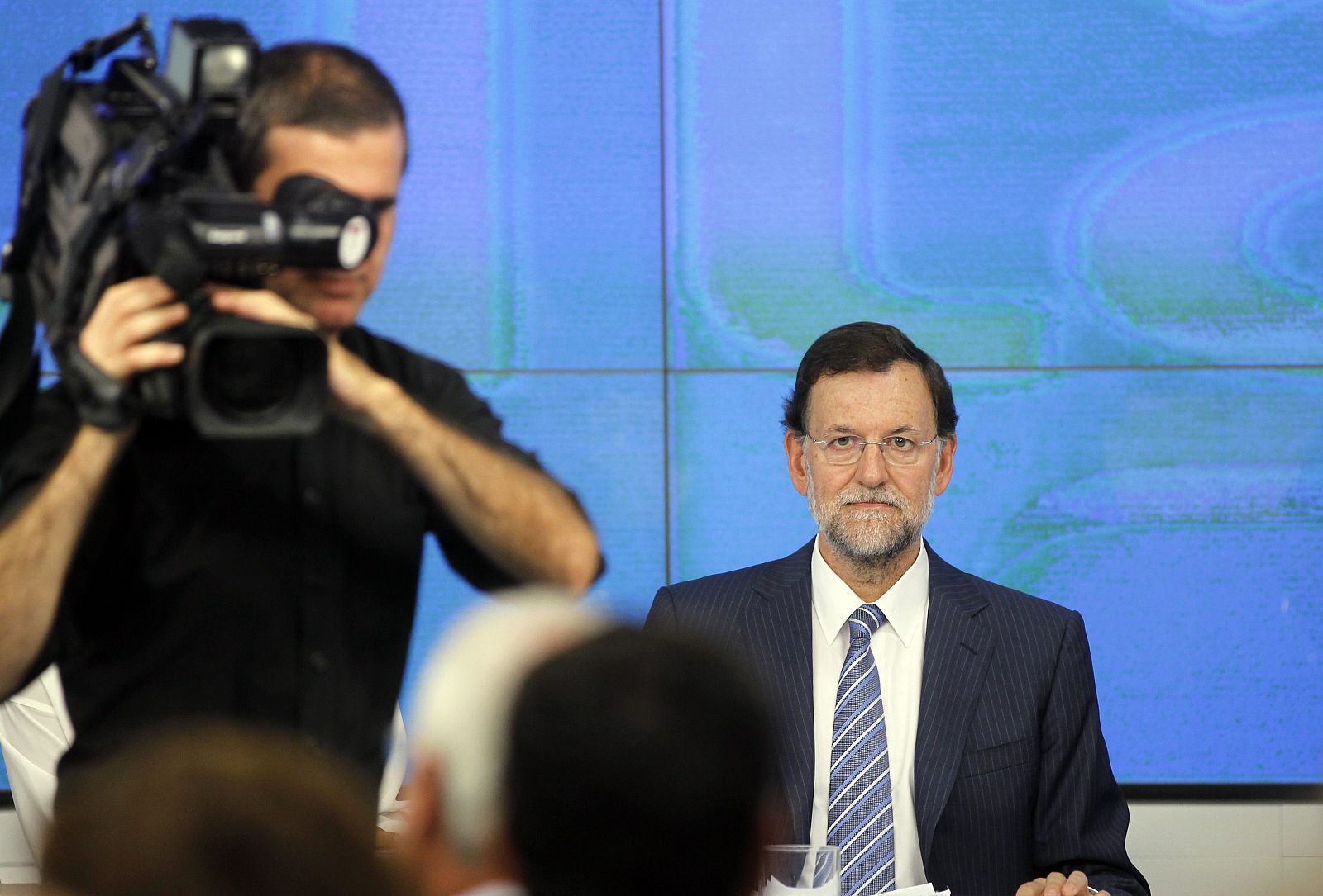 Spain's main opposition leader Rajoy gestures at the start of their party's national executive committee in Madrid