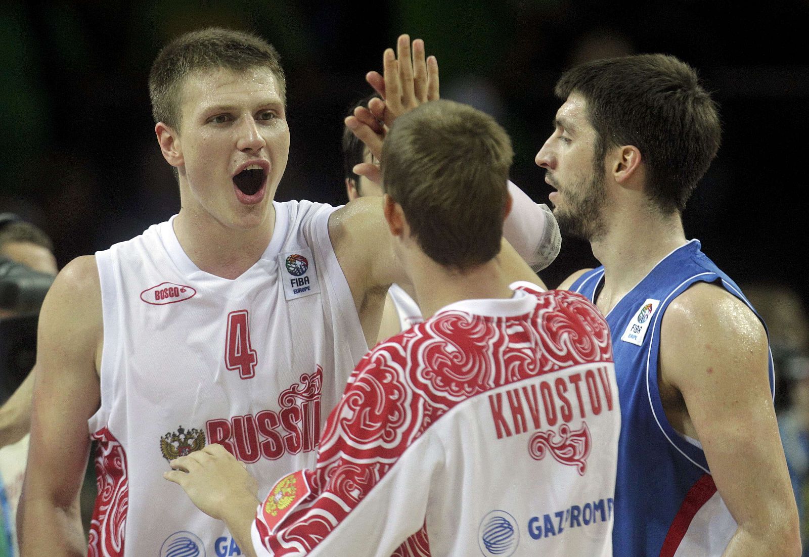 Vorontsevich and Khvostov of Russia celebrate winning their FIBA EuroBasket 2011 quarter-final basketball game against Serbia in Kaunas
