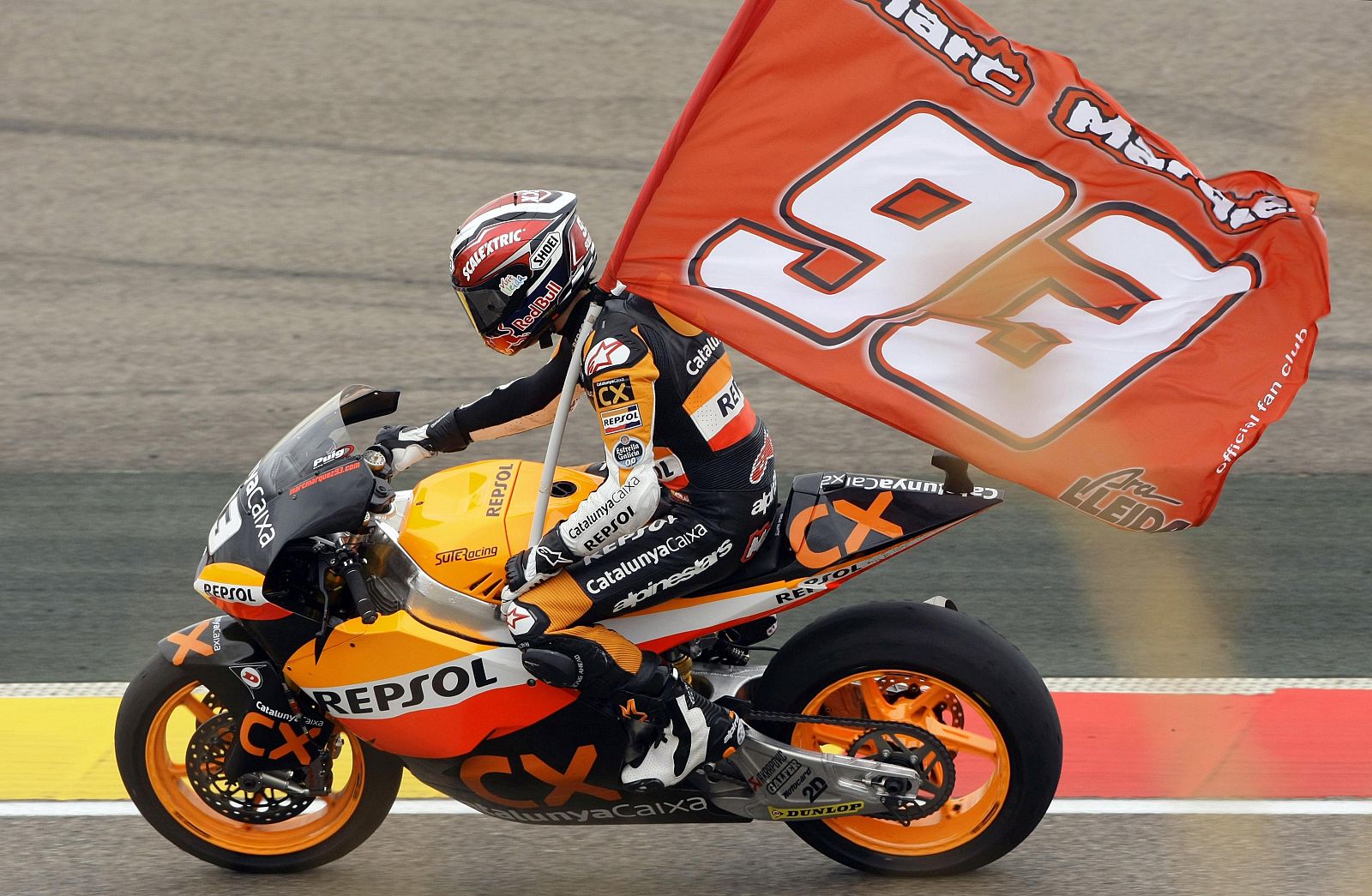 Suter Moto2 rider Marc Marquez of Spain celebrates his victory in the Aragon Grand Prix at Motorland race track in Alcaniz, near Zaragoza