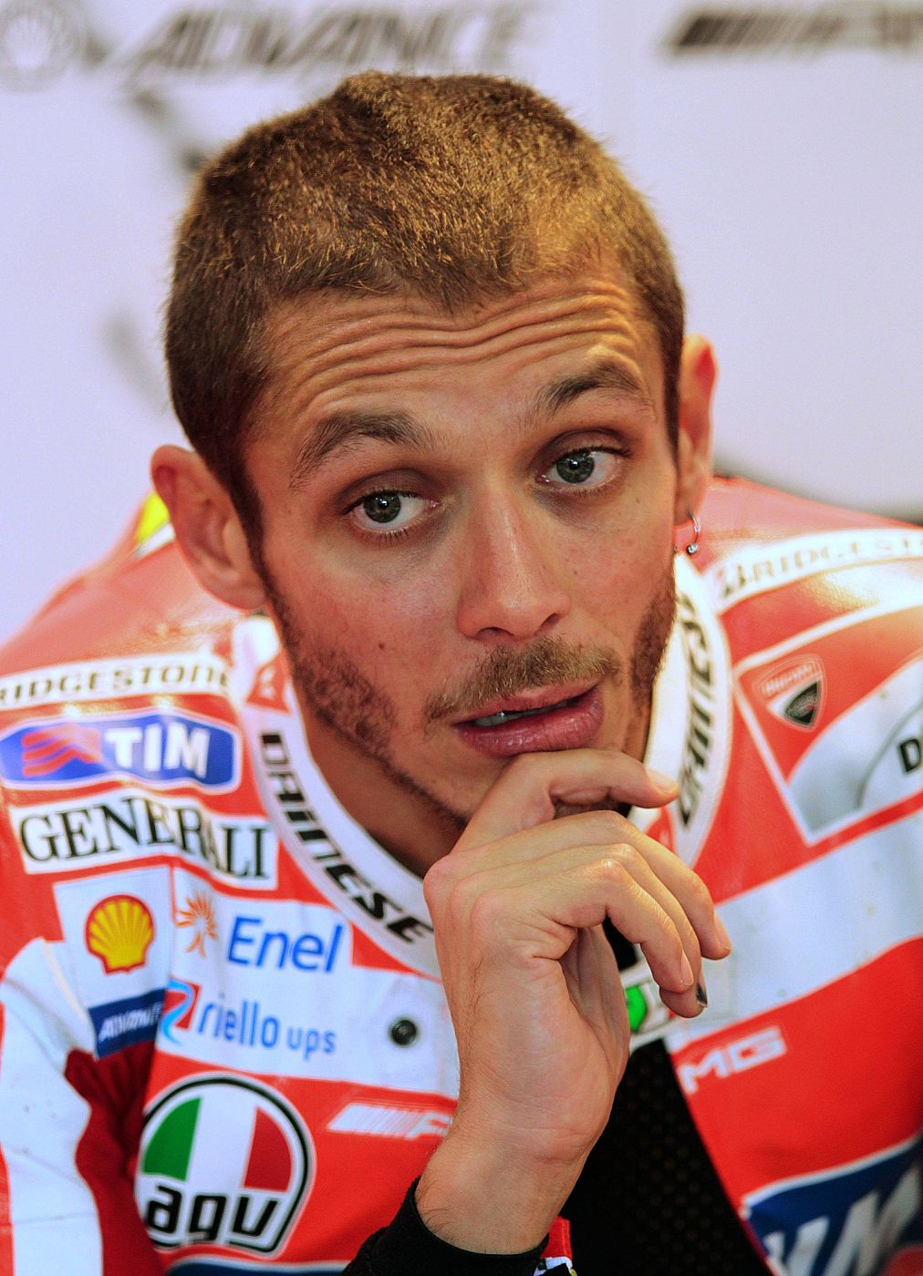 Ducati MotoGP rider Rossi of Italy gestures in his pit during the second practice session of the Australian Grand Prix on Phillip Island near Melbourne