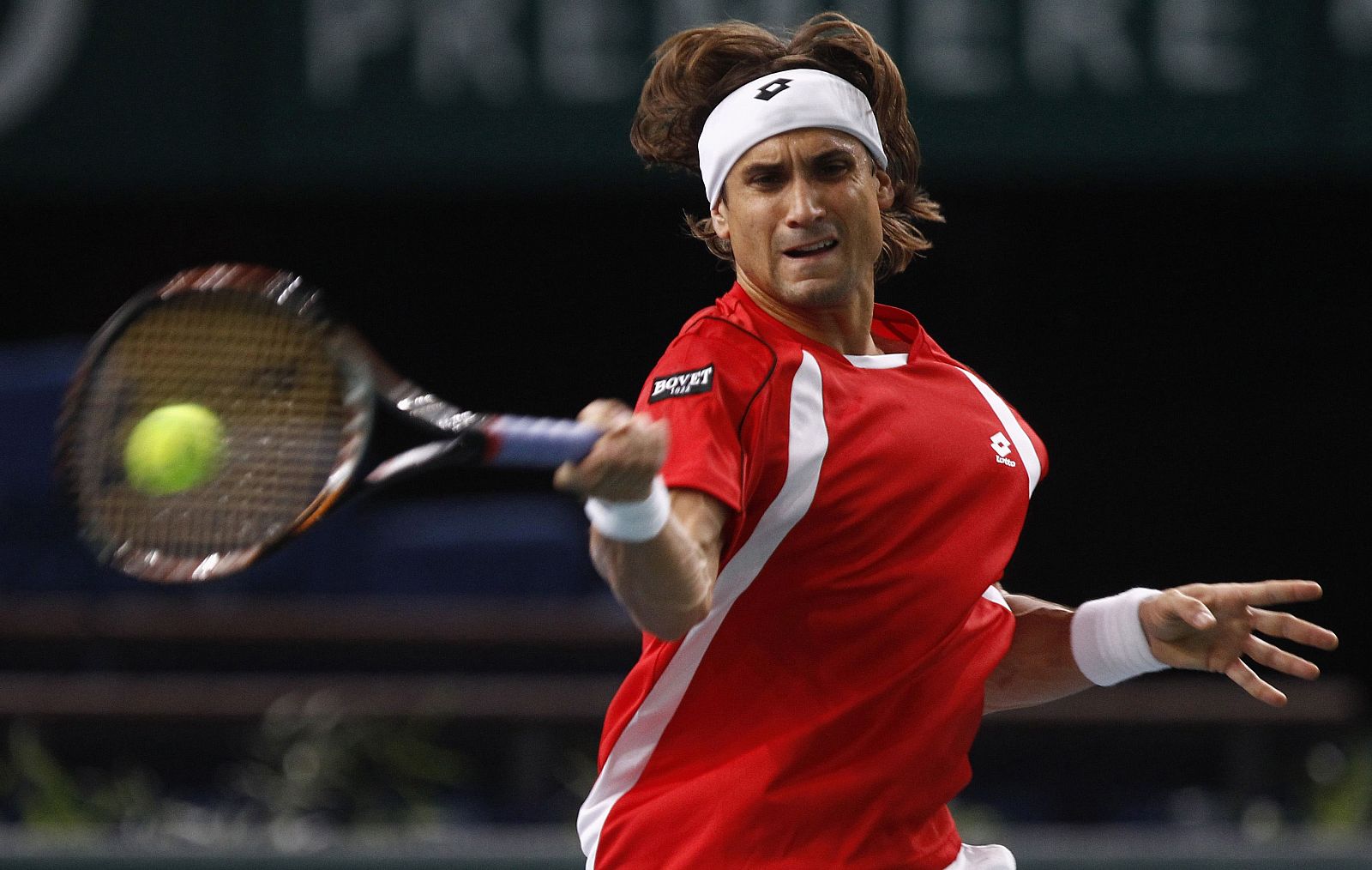 Spain's David Ferrer returns the ball to France's Nicolas Mahut during the Paris Masters tennis tournament
