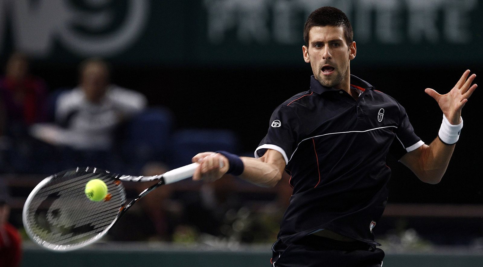 Serbia's Djokovic returns the ball to compatriot Troicki during the Paris Masters tennis tournament