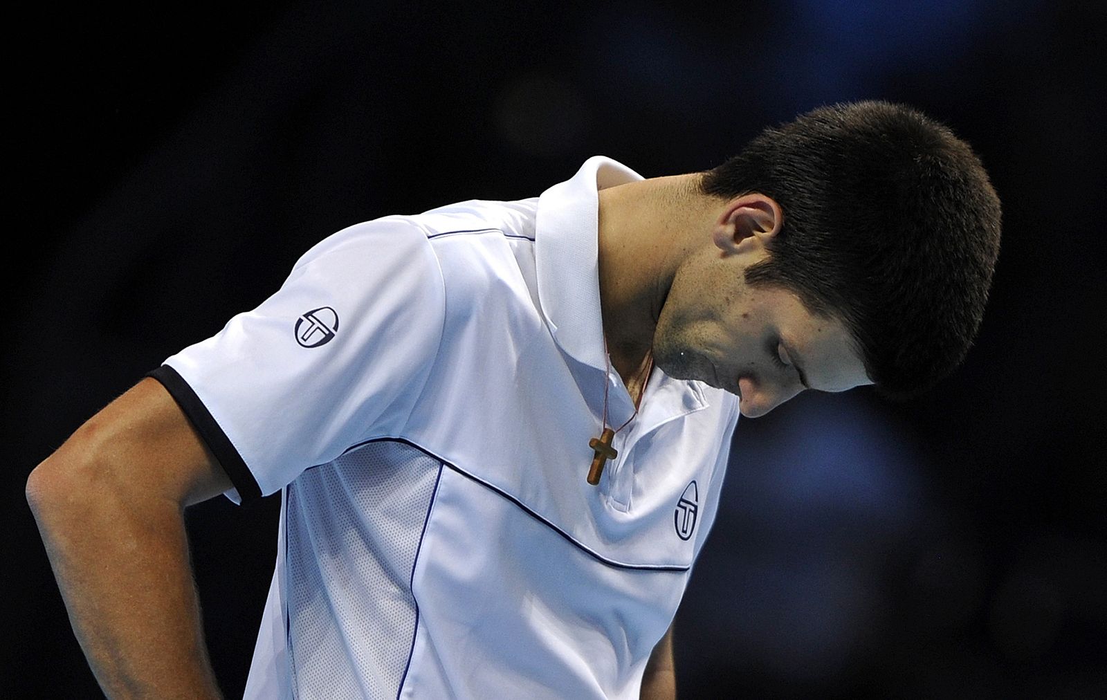 Djokovic of Serbia reacts after losing a point to compatriot Tipsarevic during their singles tennis match at the ATP World Tour Finals in London