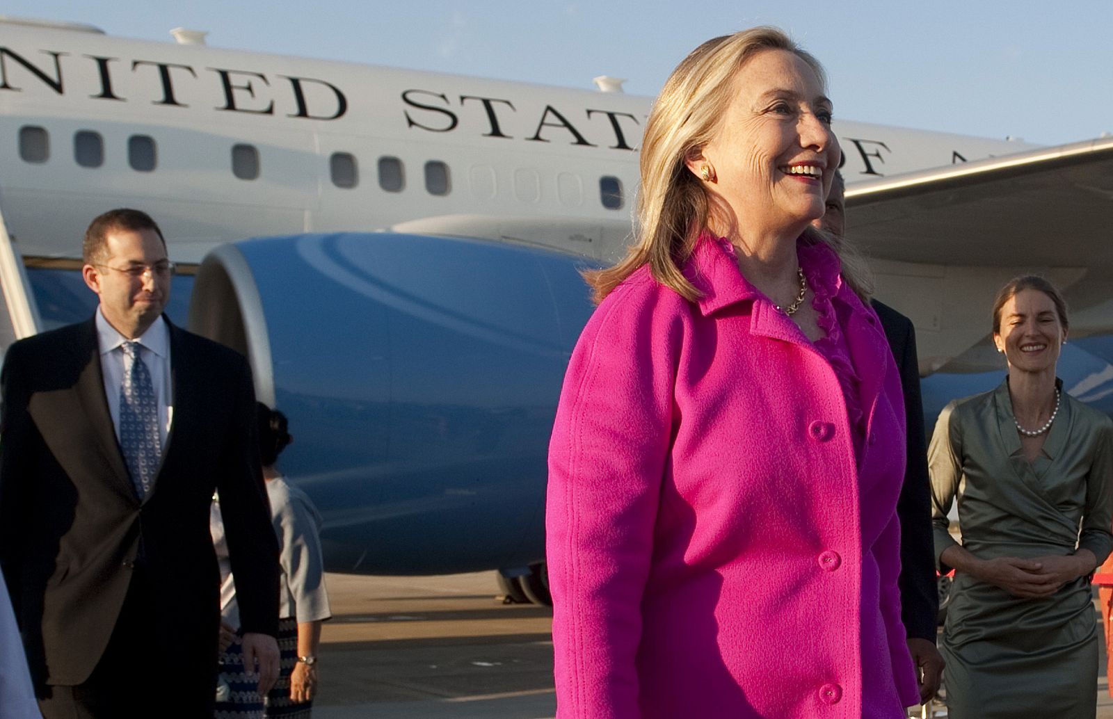 U.S. Secretary of State Clinton smiles upon her arrival in Naypyidaw, Myanmar