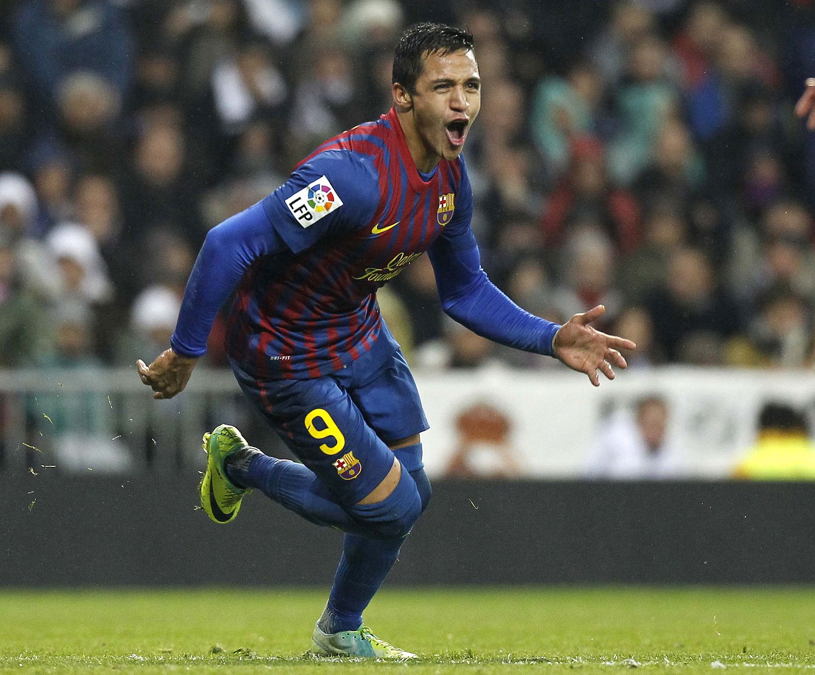 Barcelona's Alexis Sanchez celebrates his goal against Real Madrid during their Spanish first division soccer match in Madrid
