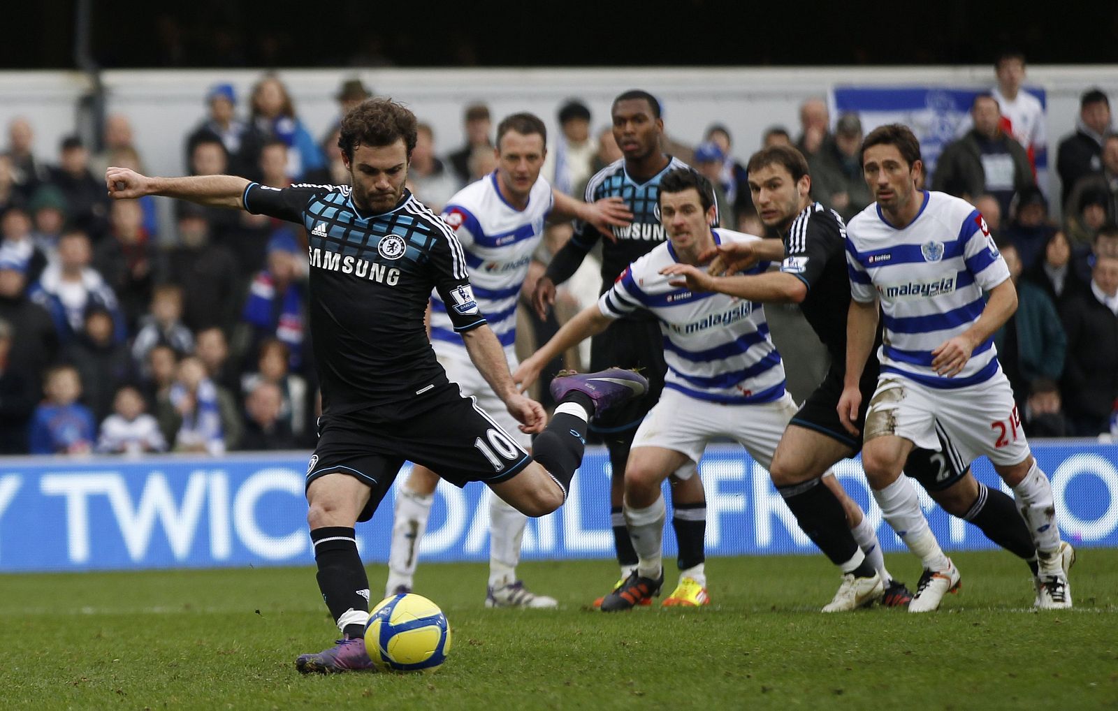 Chelsea's Mata shoots and scores from the penalty spot past Queens Park Rangers' Kenny during their FA Cup soccer match in London