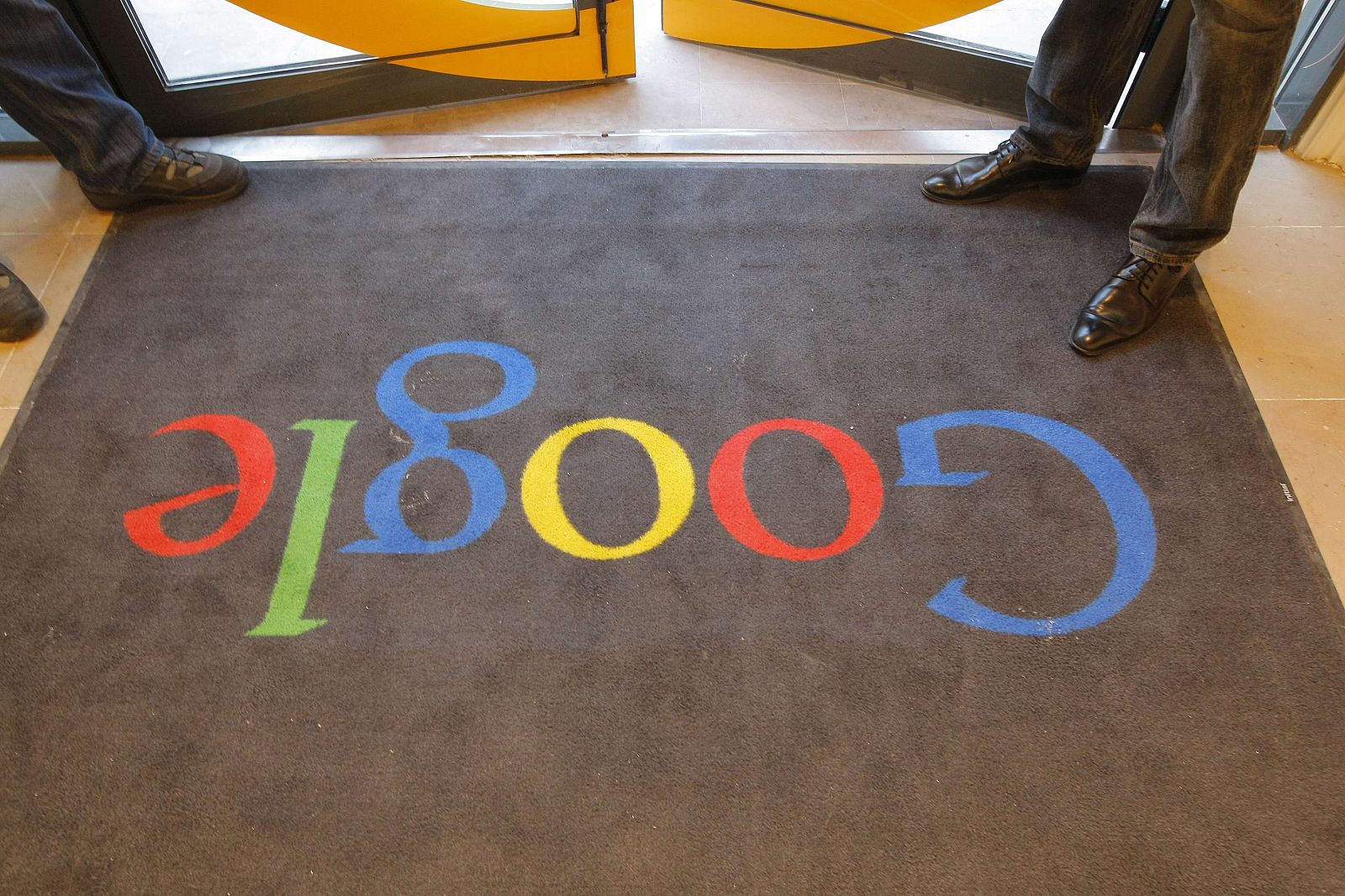 File photo shows a carpet with the Google logo at the entrance of Google France's new headquarters before its official inauguration in Paris