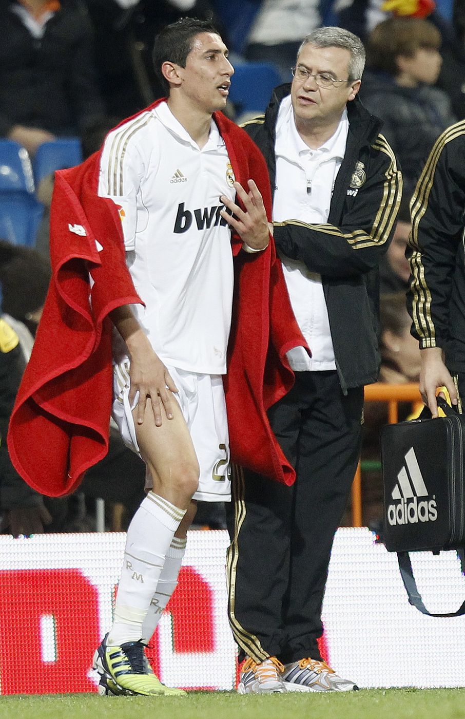 Real Madrid's Di Maria reacts after being injured during their Spanish First Division soccer match against Racing Santander in Madrid
