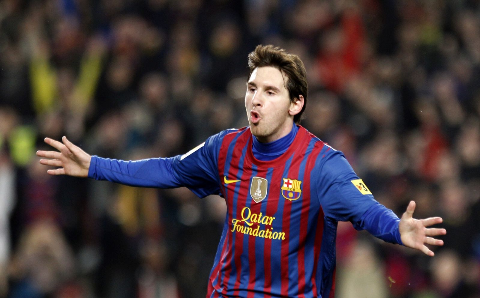 Barcelona's Messi celebrates after scoring his fourth goal against Valencia during their Spanish first division soccer match in Barcelona