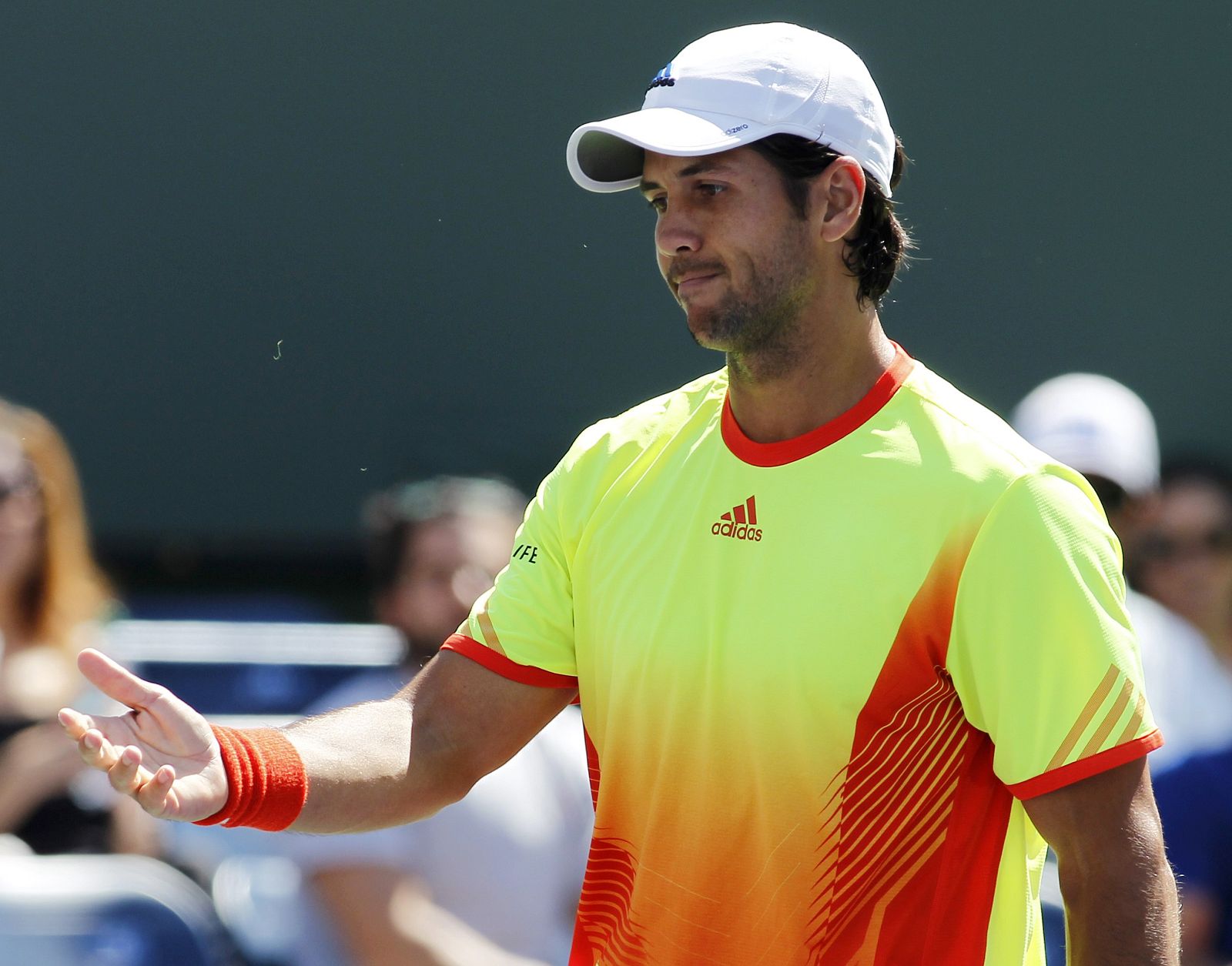 Verdasco of Spain reacts to losing a point against Del Potro of Argentina during their match at the Indian Wells ATP tennis tournament
