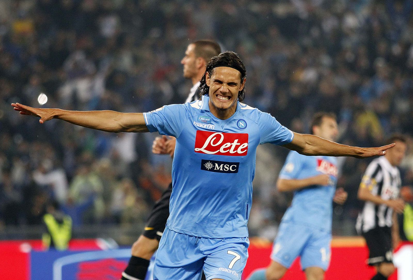 Napoli's Cavani celebrates after scoring against Juventus during their Italian Cup final at the Olympic stadium in Rome