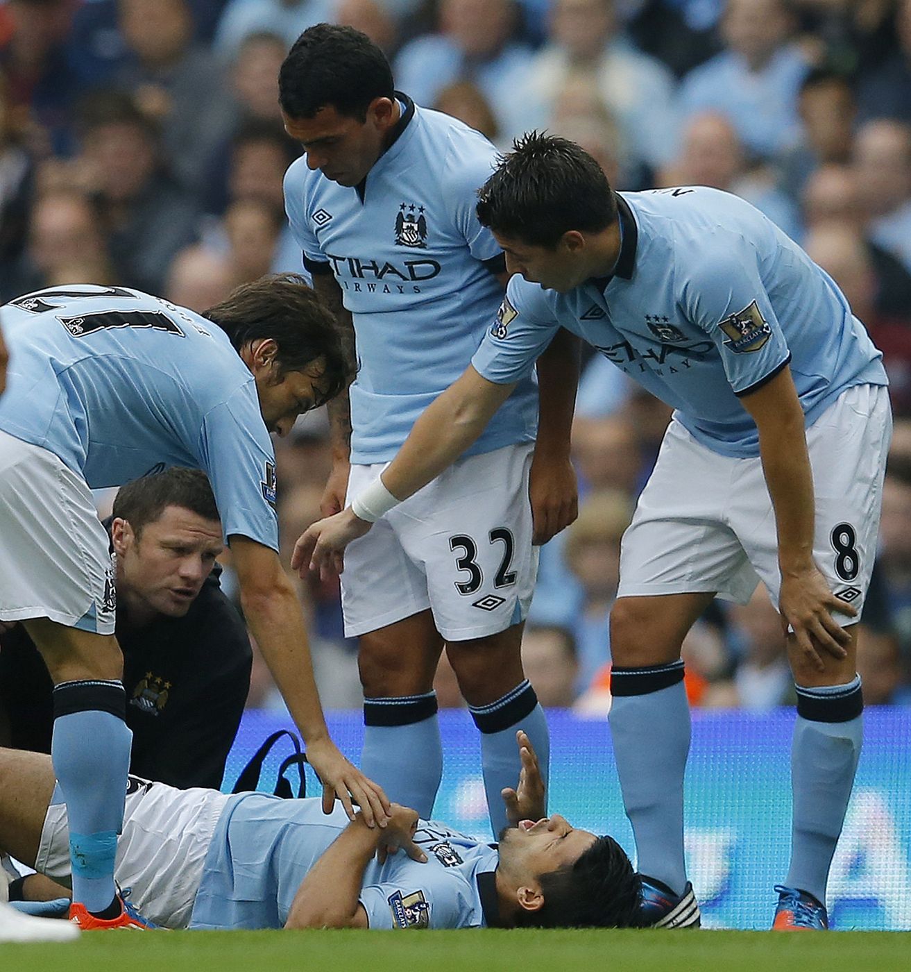 Manchester City's Aguero receives treatment after being injured during their English Premier League soccer match against Southampton in Manchester