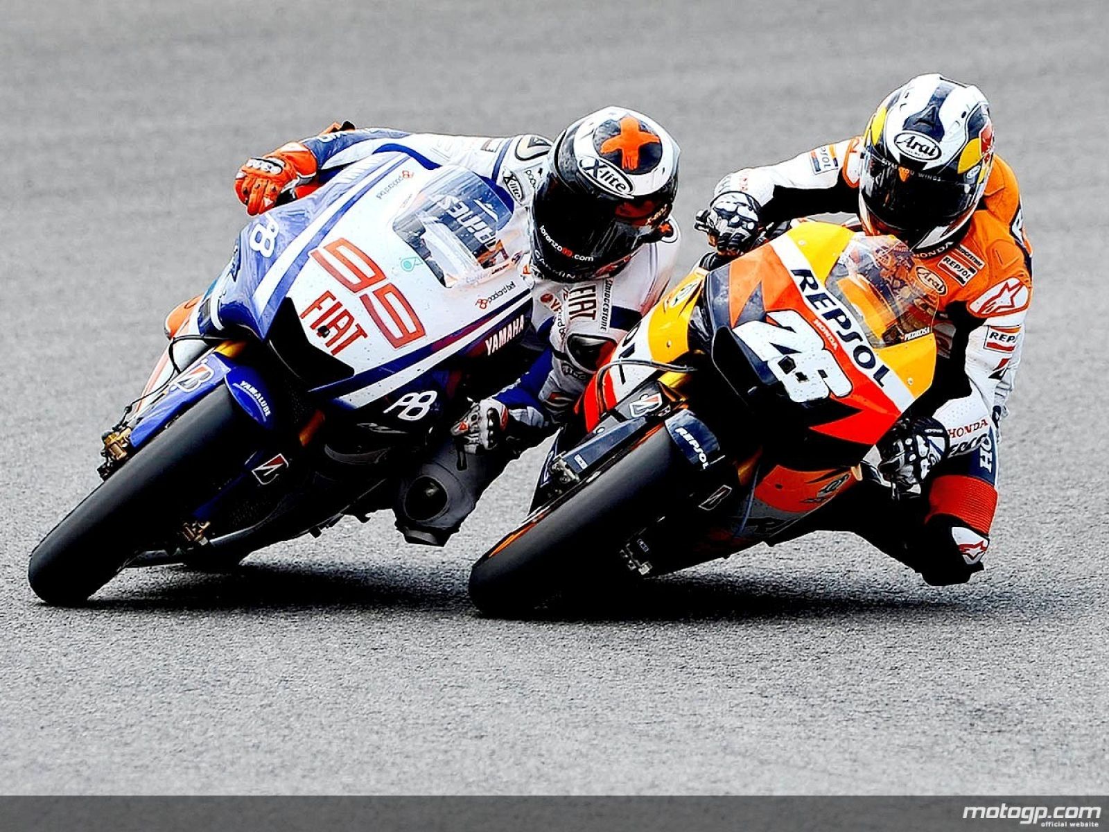 Jorge Lorenzo (i) y Dani Pedrosa (d).