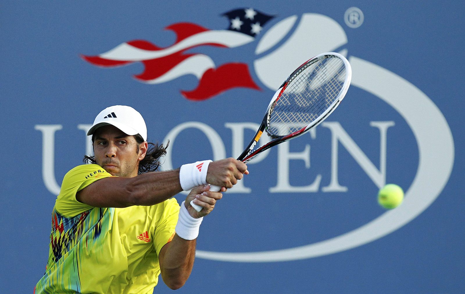Verdasco of Spain hits a return to Machado of Portugal during their men's singles match at the U.S. Open tennis tournament in New York