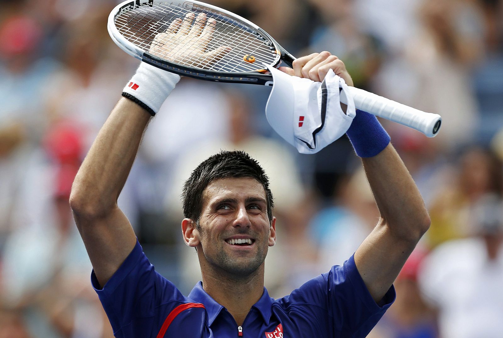 Djokovic of Serbia celebrates after defeating Benneteau of France during their men's singles match at the U.S. Open tennis tournament in New York