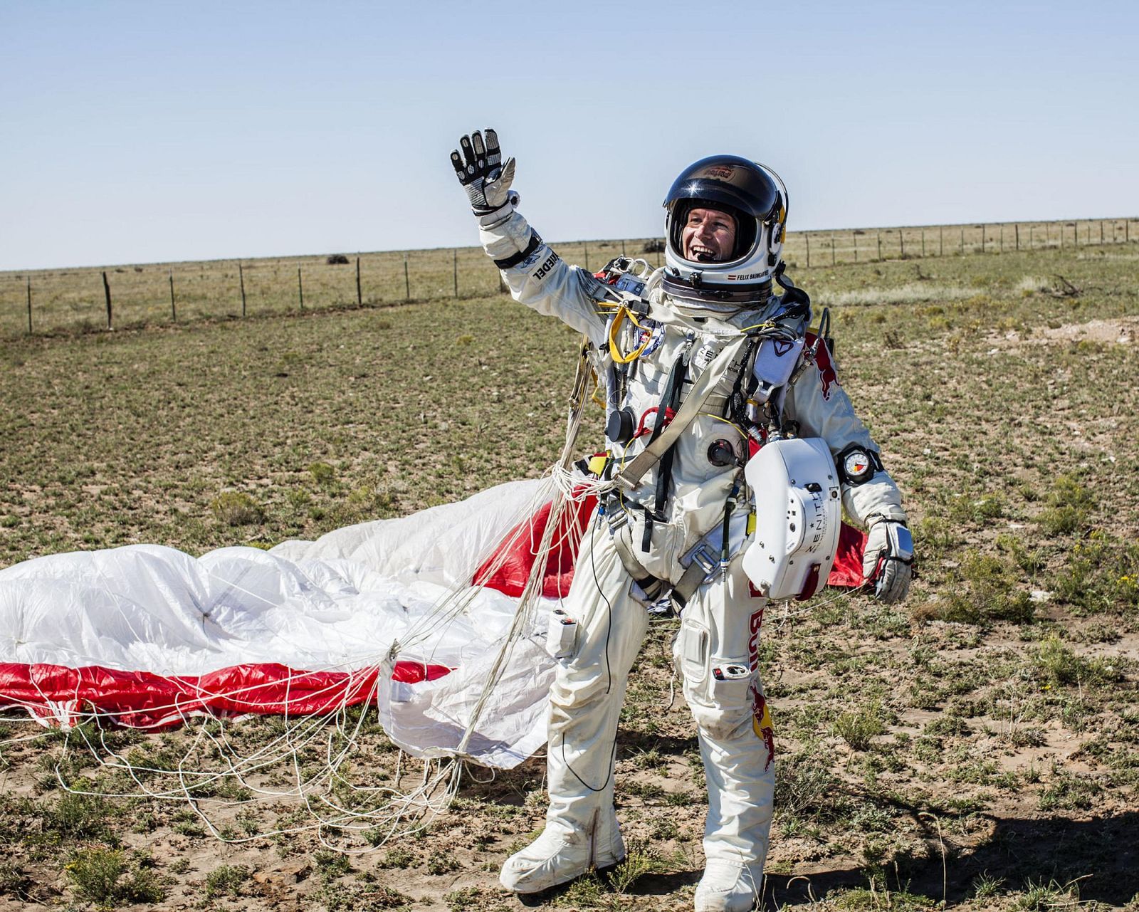 Pilot Felix Baumgartner of Austria celebrates after successfully completing the final manned flight for Red Bull Stratos in Roswell