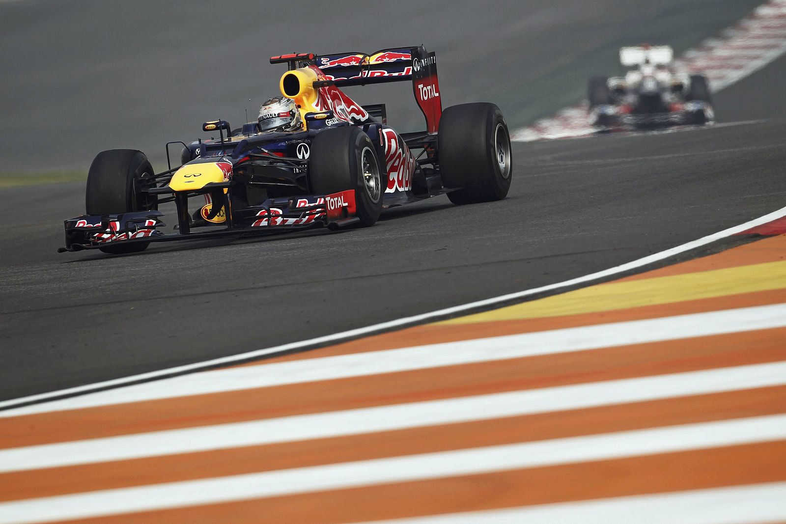 Red Bull Formula One driver Vettel drives during the third practice session of the Indian F1 Grand Prix at the Buddh International Circuit in Greater Noida