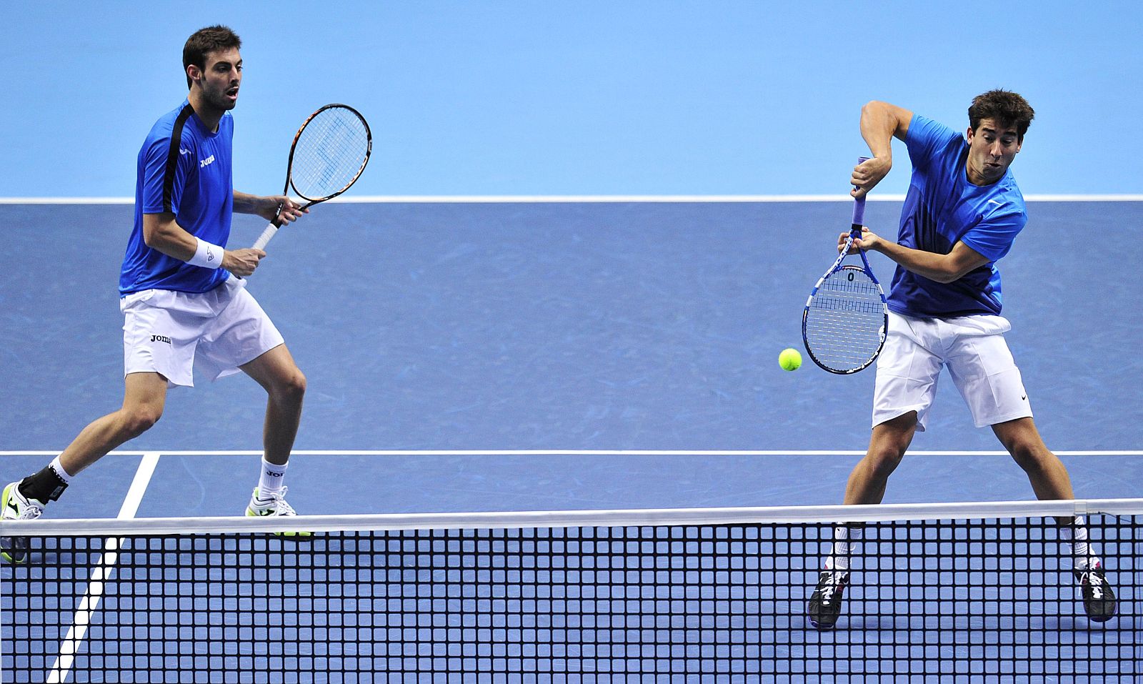 Granollers (i) y López en su partido de la copa Masters ante Paes y Stepanek