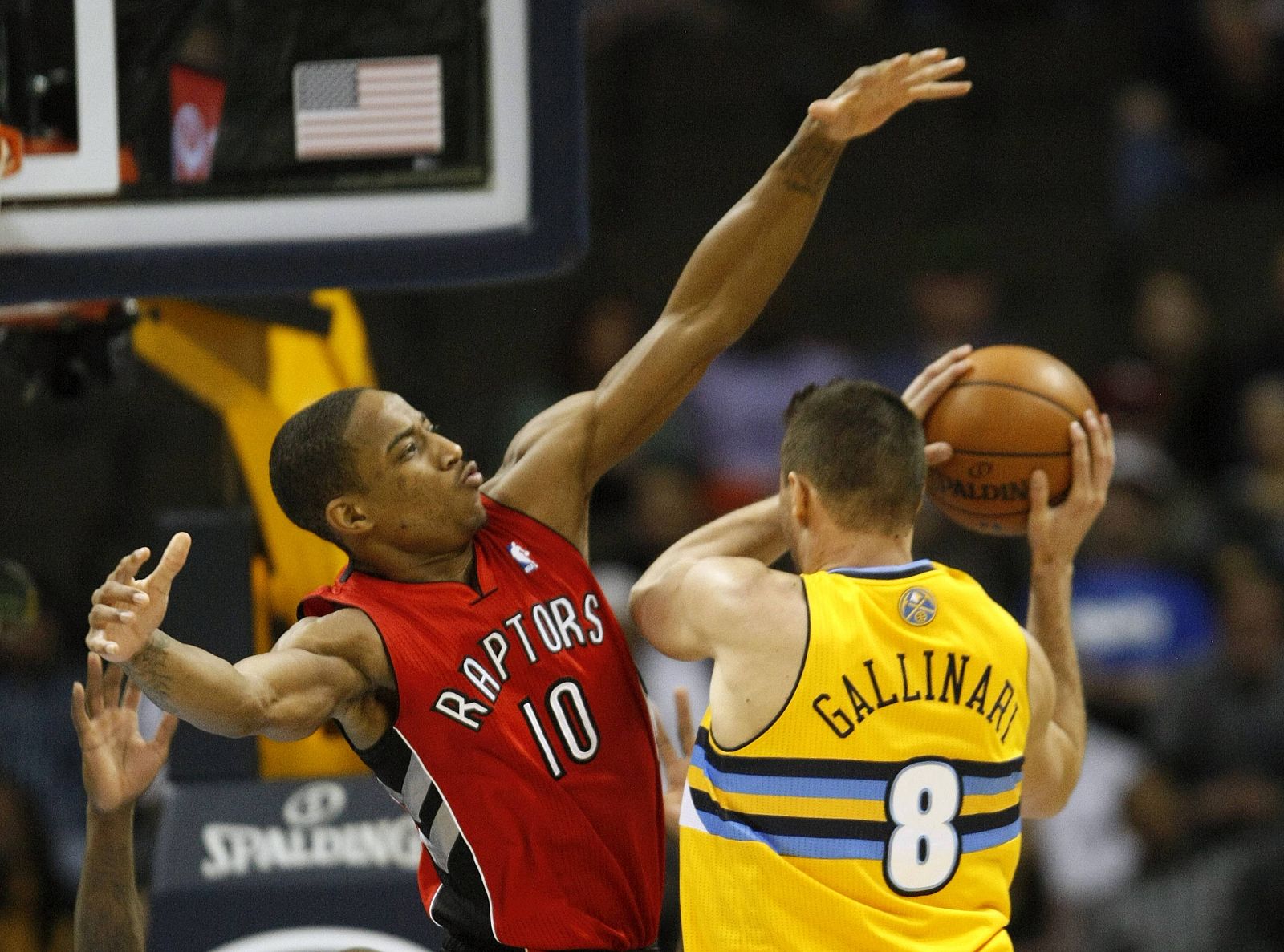 Toronto Raptors Stone defends Denver Nuggets Gallinari in the fourth quarter in their NBA basketball game in Denver