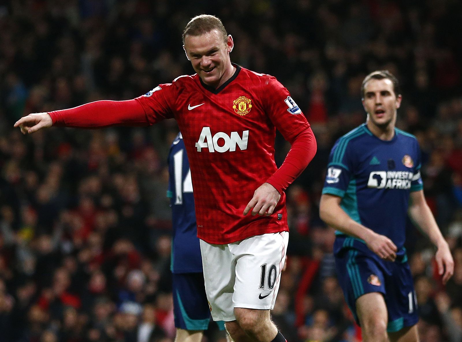 Manchester United's Rooney celebrates his goal against Sunderland during their English Premier League soccer match in Manchester