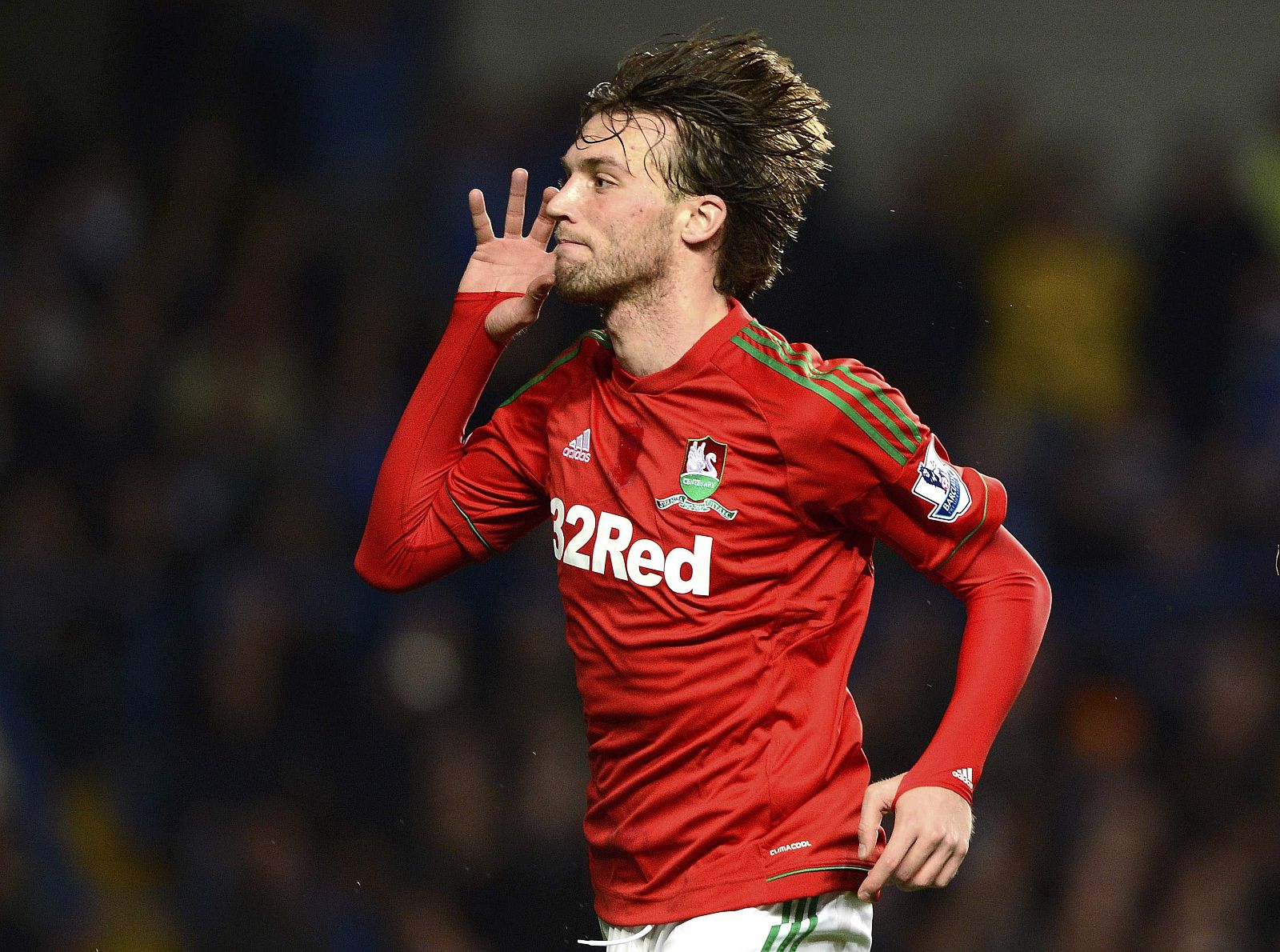 Swansea City's Michu celebrates after scoring against Chelsea during English League Cup semi-final soccer match in London