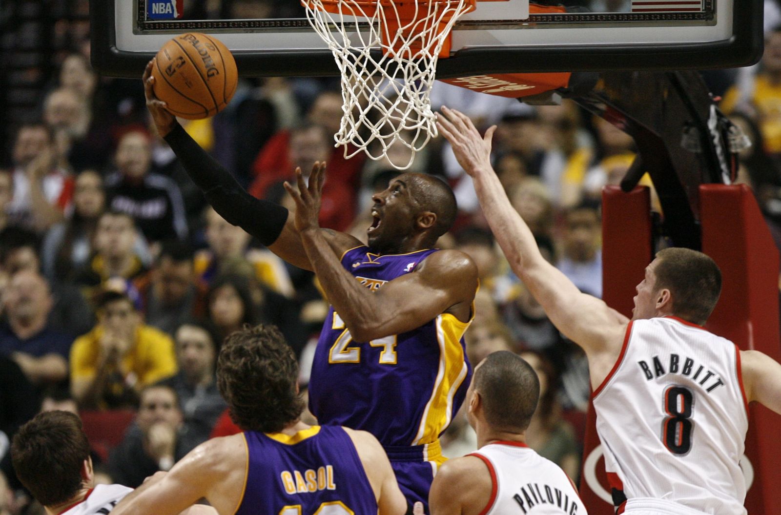 Los Angeles Lakers Bryant shoots against the Portland Trail Blazers during first quarter of their NBA basketball game in Portland,