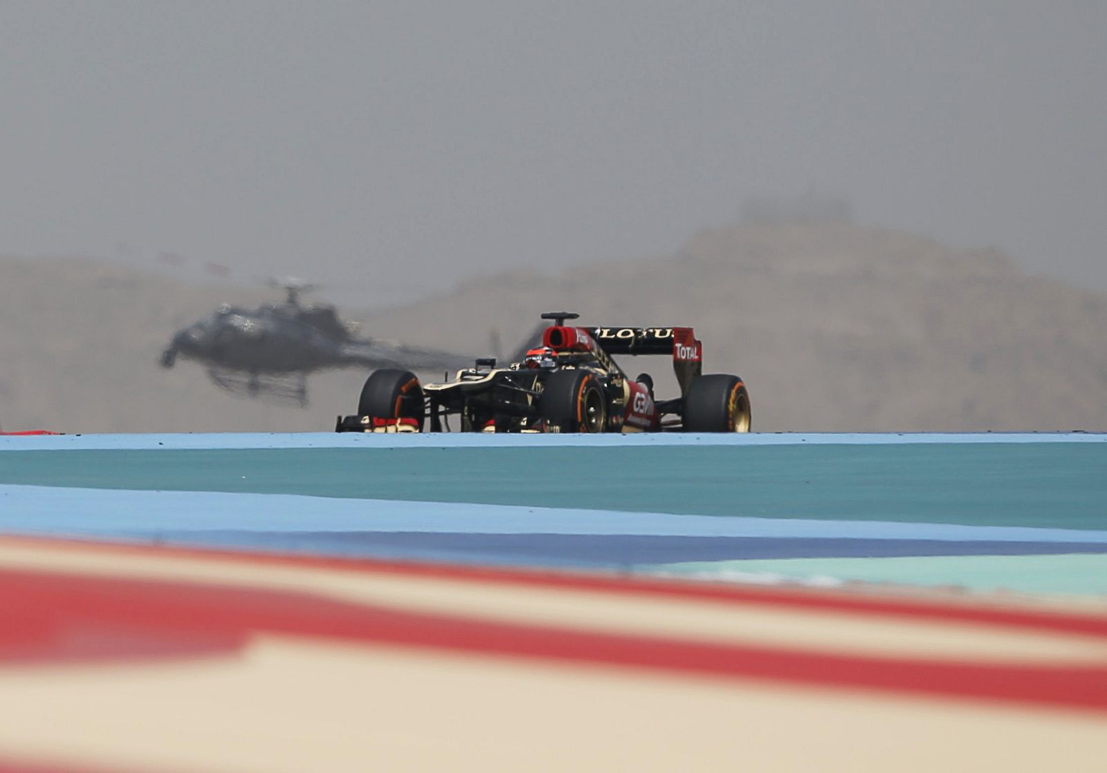 Lotus Formula One driver Raikkonen drives during the second practice session of the Bahrain F1 Grand Prix at the Sakhir circuit