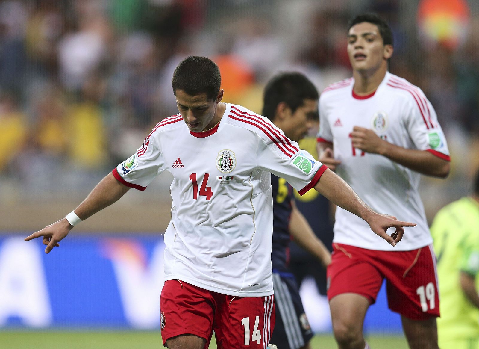 Mexico's Javier Hernandez celebrates after scoring a goal against Japan during their Confederations Cup Group A soccer match at the Estadio Mineirao in Belo Horizonte