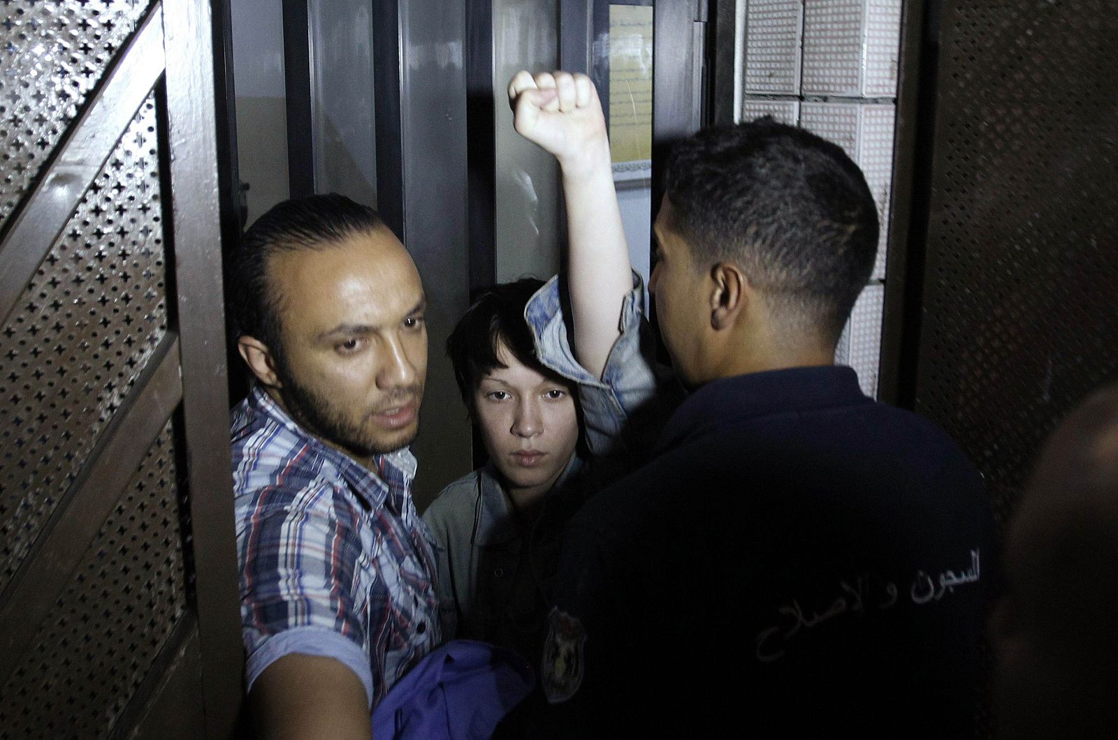 Stern, a member of the women's rights group Femen, gestures after she is released from prison in Tunis
