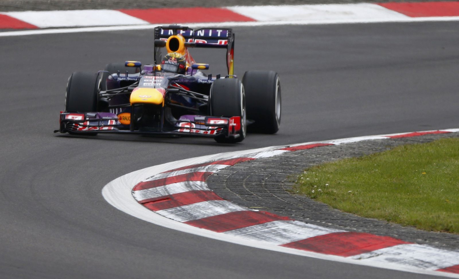 Red Bull Formula One driver Vettel takes corner during second practice session of German F1 Grand Prix at Nuerburgring
