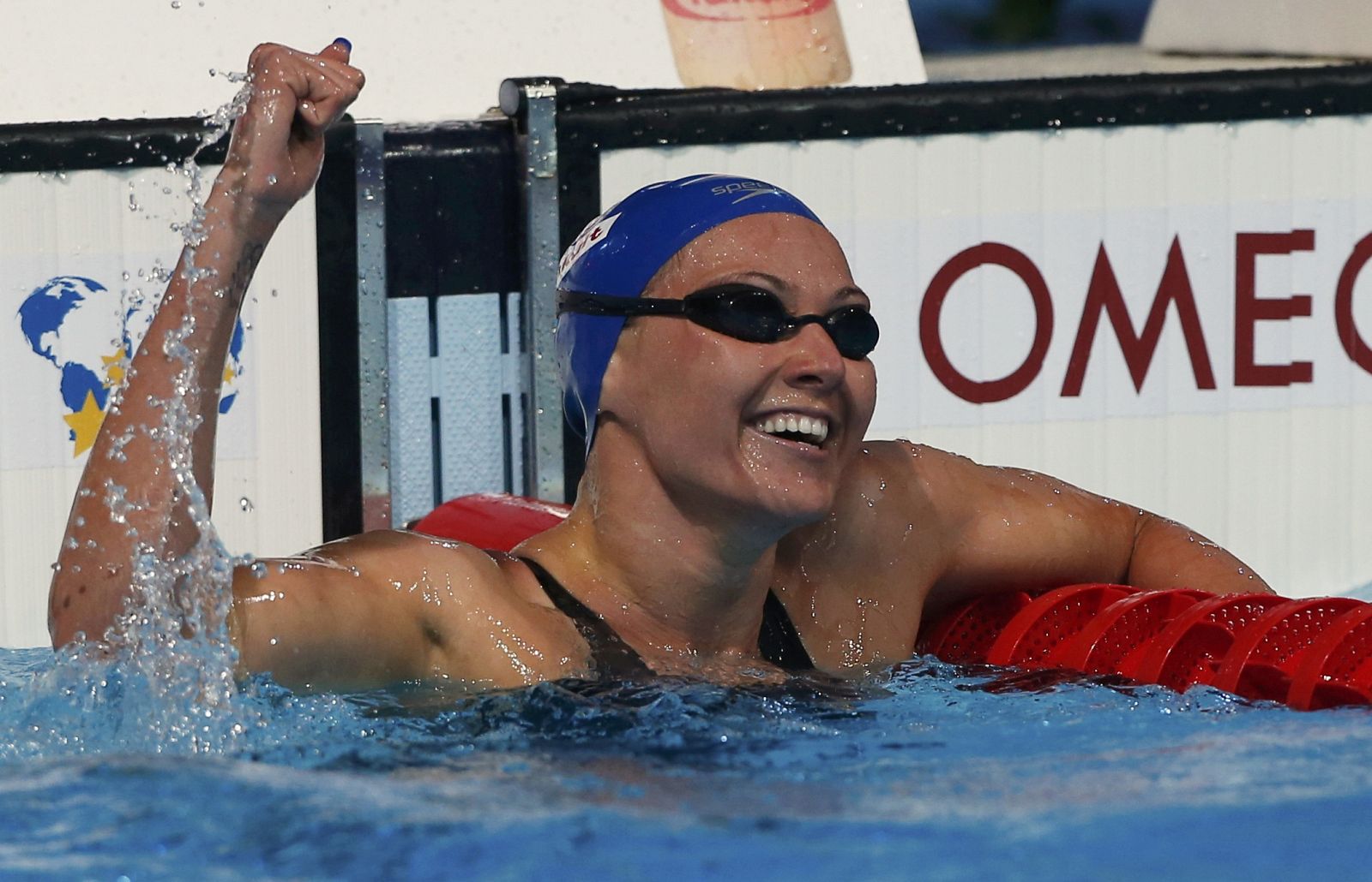 Spain's Melanie Costa Schmid celebrates after finishing first in her women's 200m freestyle semi-final during the World Swimming Championships at the Sant Jordi arena in Barcelona
