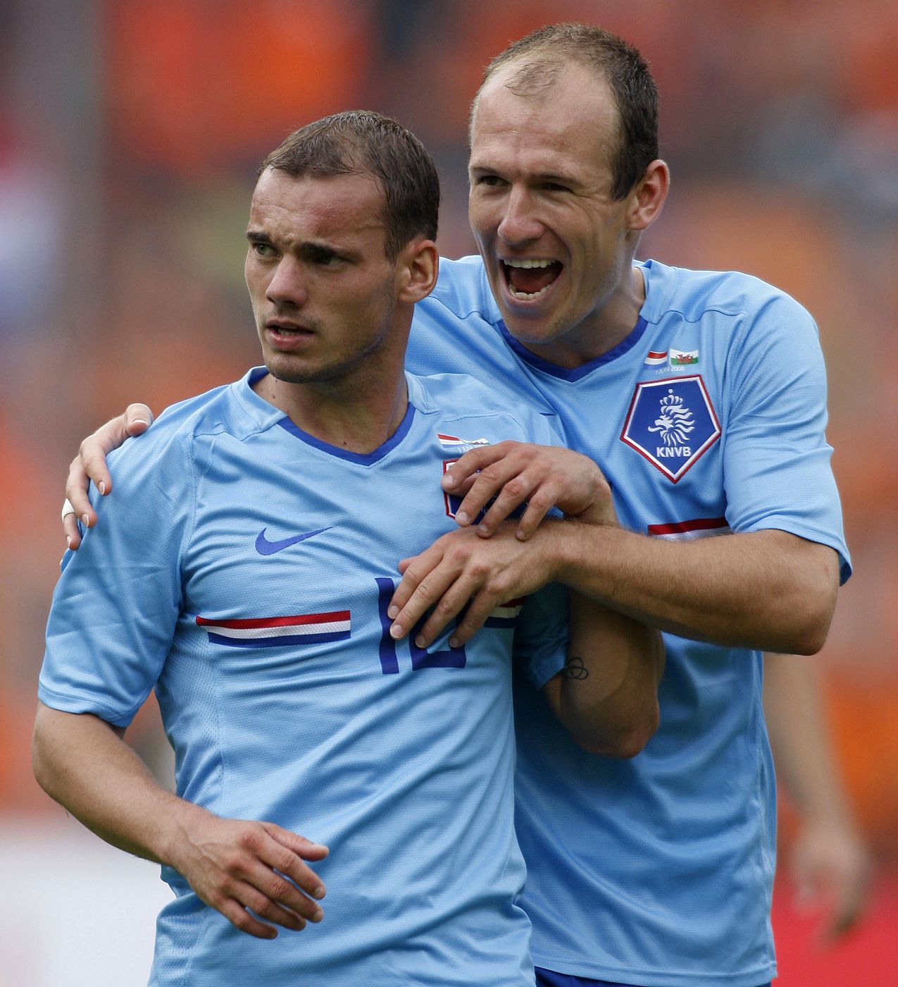 Sneijder and Robben of the Netherlands celebrate Sneijder's goal during their soccer friendly against Wales in preparation for Euro 2008 in Rotterdam