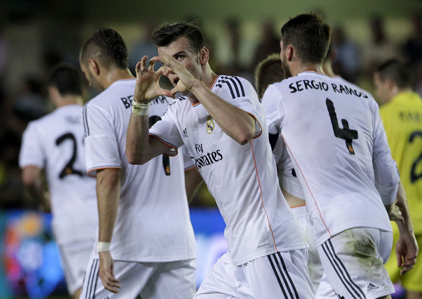 Real Madrid's Gareth Bale celebrates after he scored against Villarreal during their Spanish first division soccer match at the Madrigal stadium in Villarreal