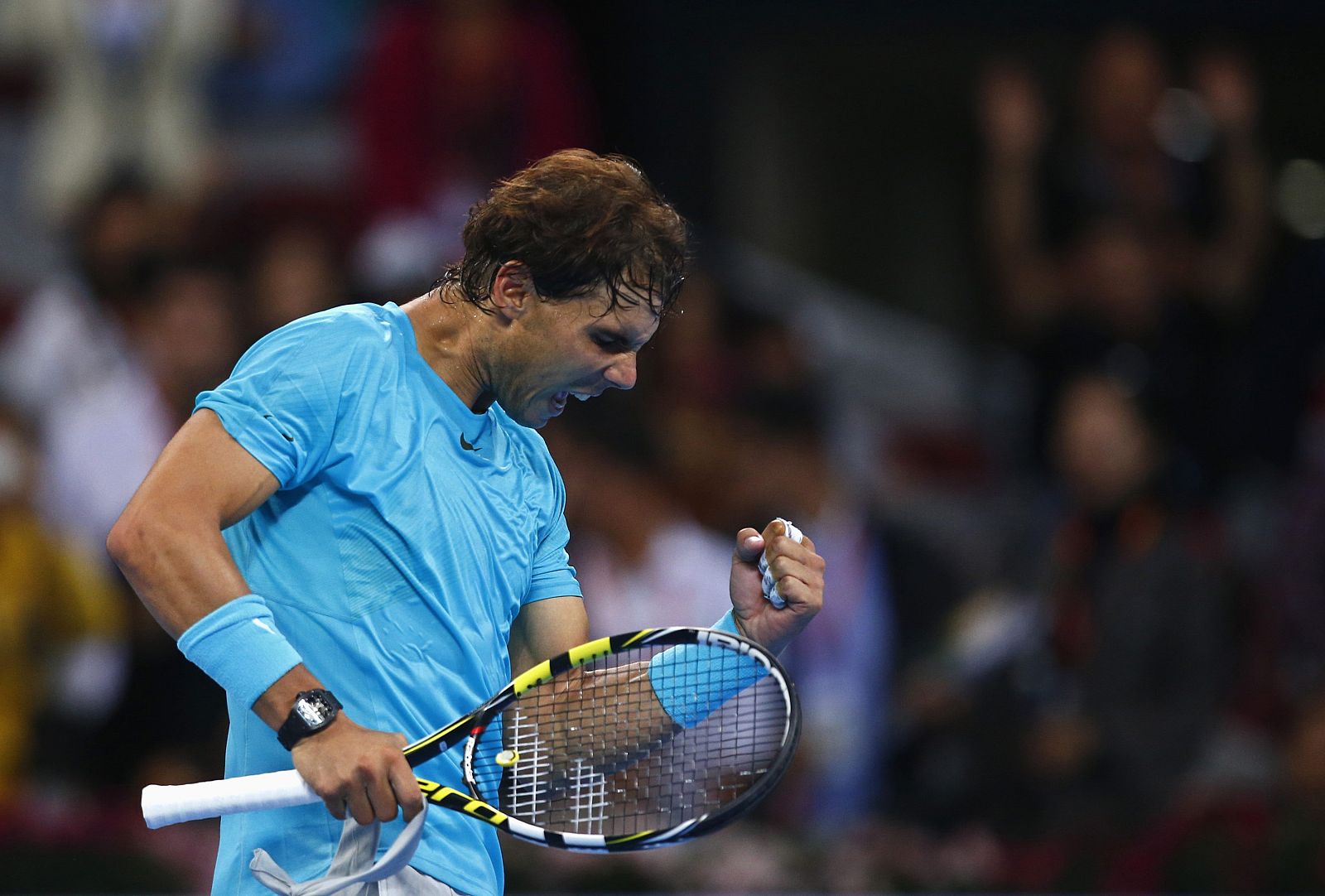 Spain's Nadal reacts after winning match against Giraldo of Colombia at China Open tennis tournament in Beijing