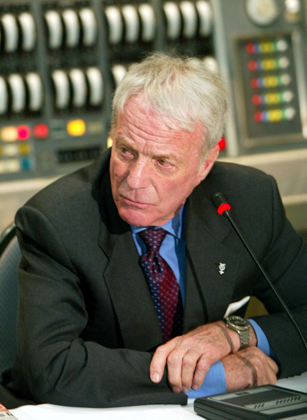 Mercury astronaut Scott Carpenter listens to questions during a press conference at the Kennedy Space Center Visitors Center in this file photo