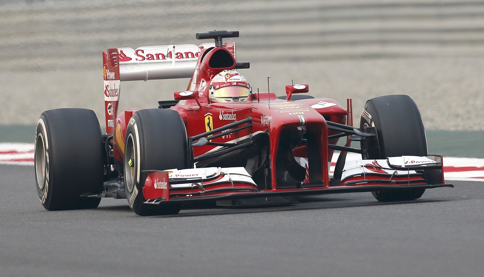 Ferrari Formula One driver Alonso drives during the Indian F1 Grand Prix at the Buddh International Circuit in Greater Noida