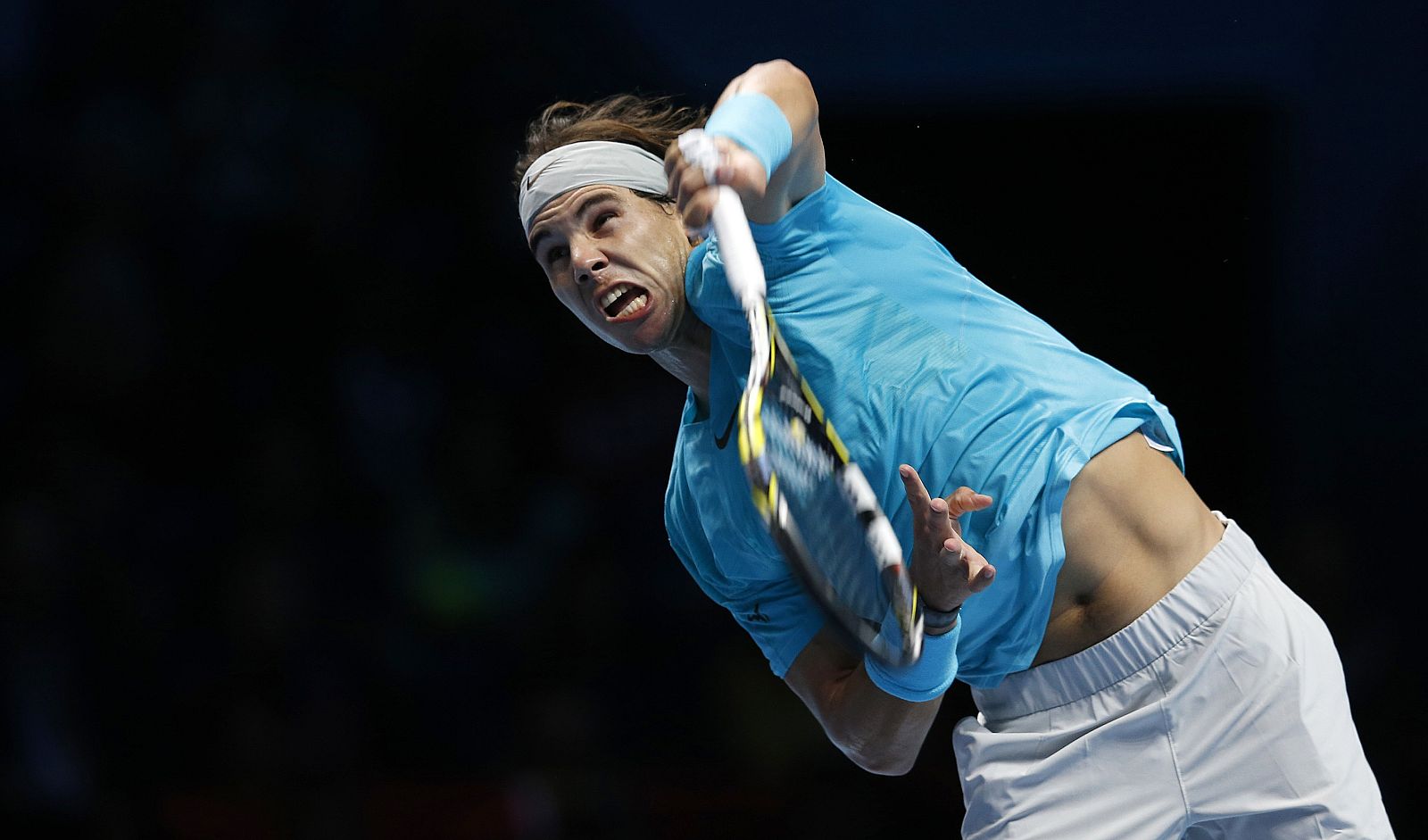 Nadal of Spain serves during his men's singles tennis match against compatriot Ferrer at the ATP World Tour Finals at the O2 Arena in London