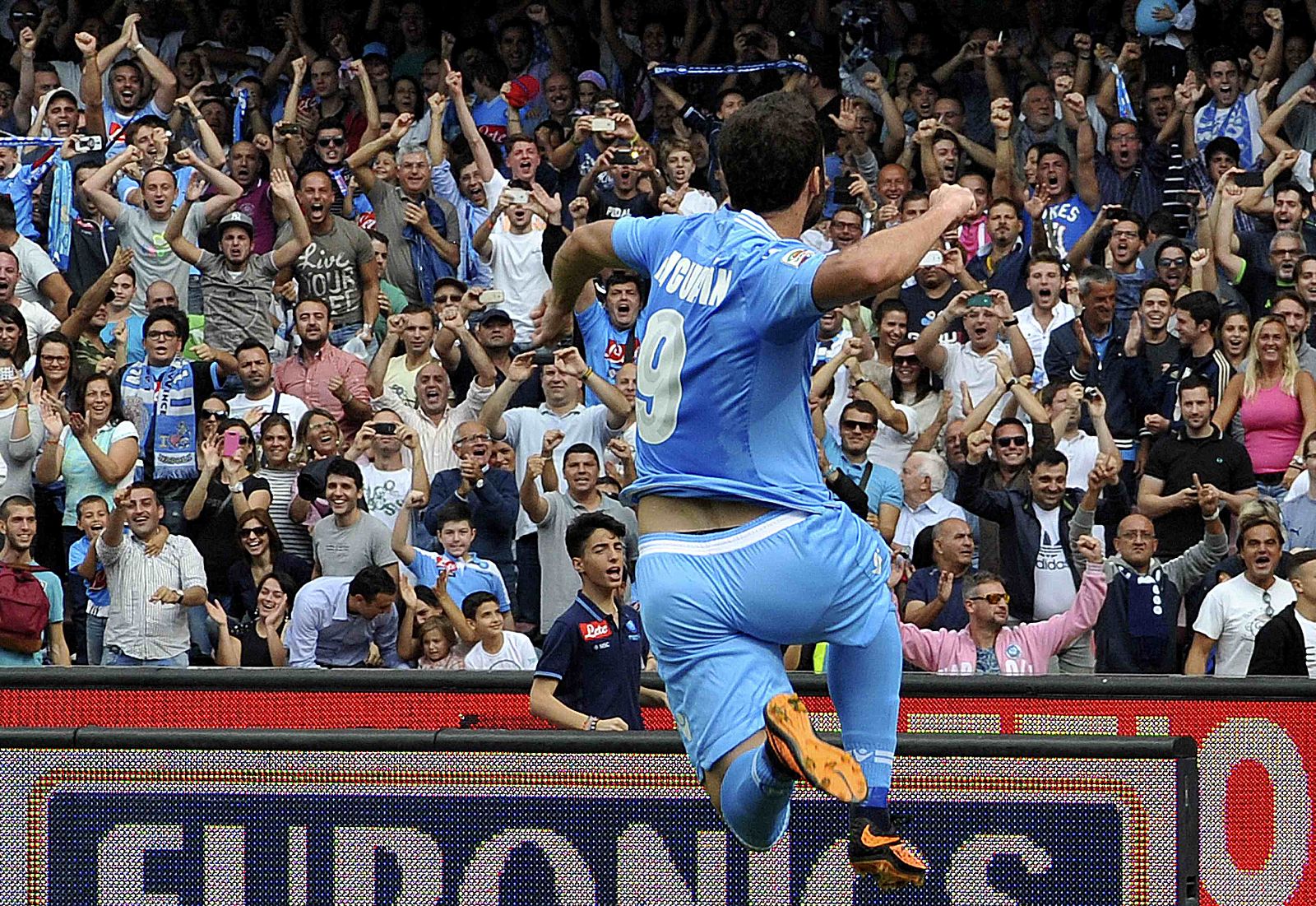 Napoli's Higuain celebrates after scoring by penalty during their Serie A soccer match against Torino in Naples