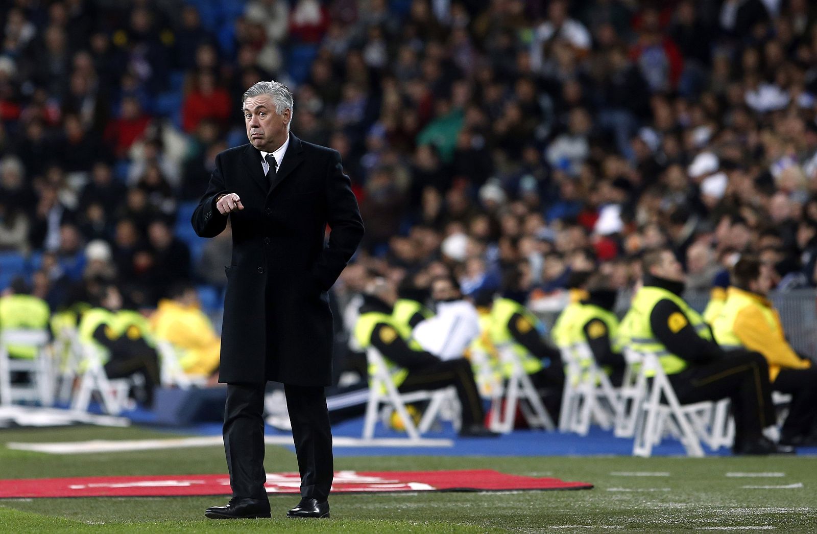 Real Madrid's coach Ancelotti gestures during their Spanish First Division soccer match against Real Valladolid in Madrid