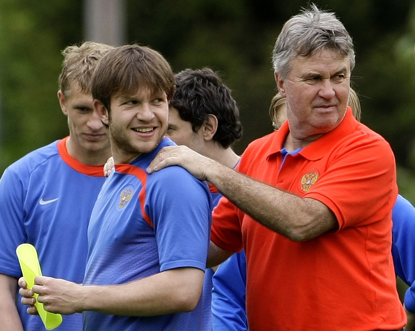 Dutch coach of the Russian national soccer team Hiddink and Saenko joke during a training session in Rottach-Egern