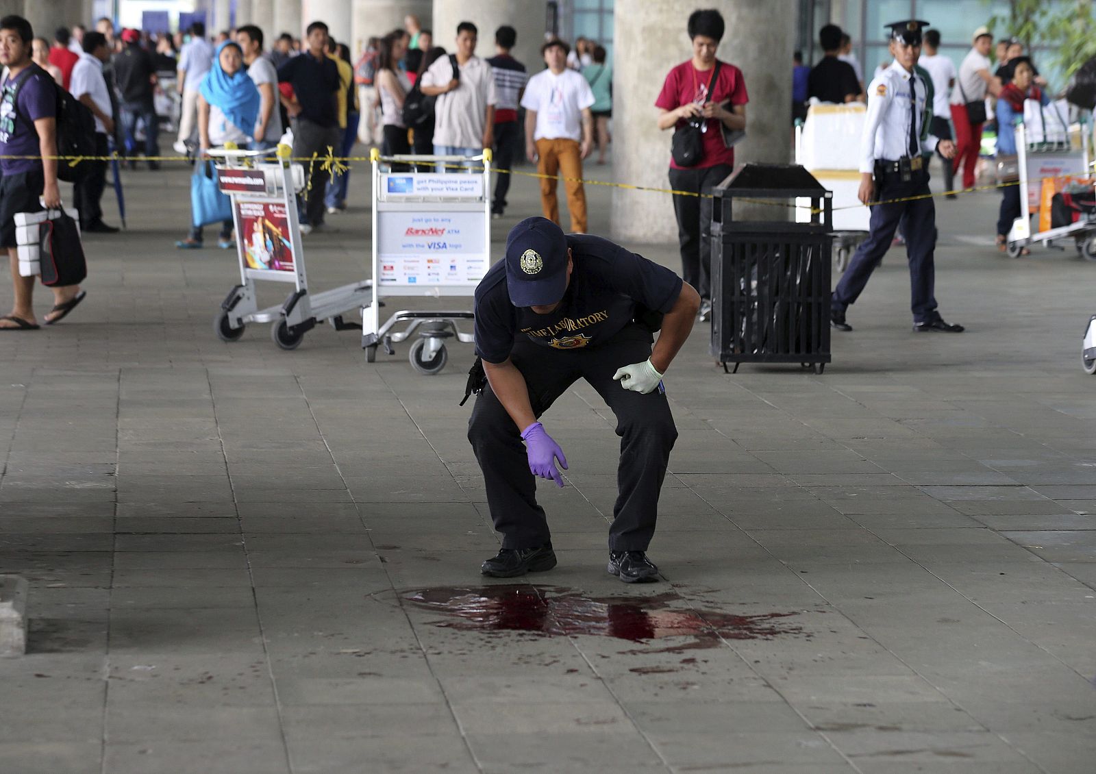 UN ALCALDE ENTRE LOS 4 MUERTOS EN UN TIROTEO EN EL AEROPUERTO DE MANILA