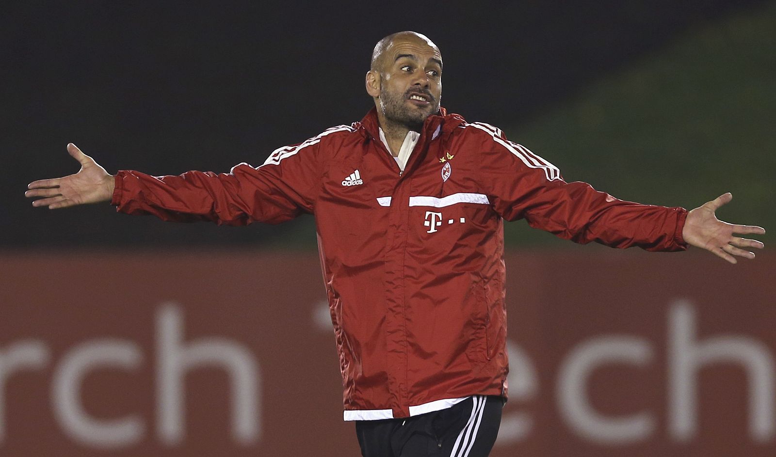 Bayern Munich's coach, Pep Guardiola reacts during a training session at Aspire Academy for Sports Excellence in Doha